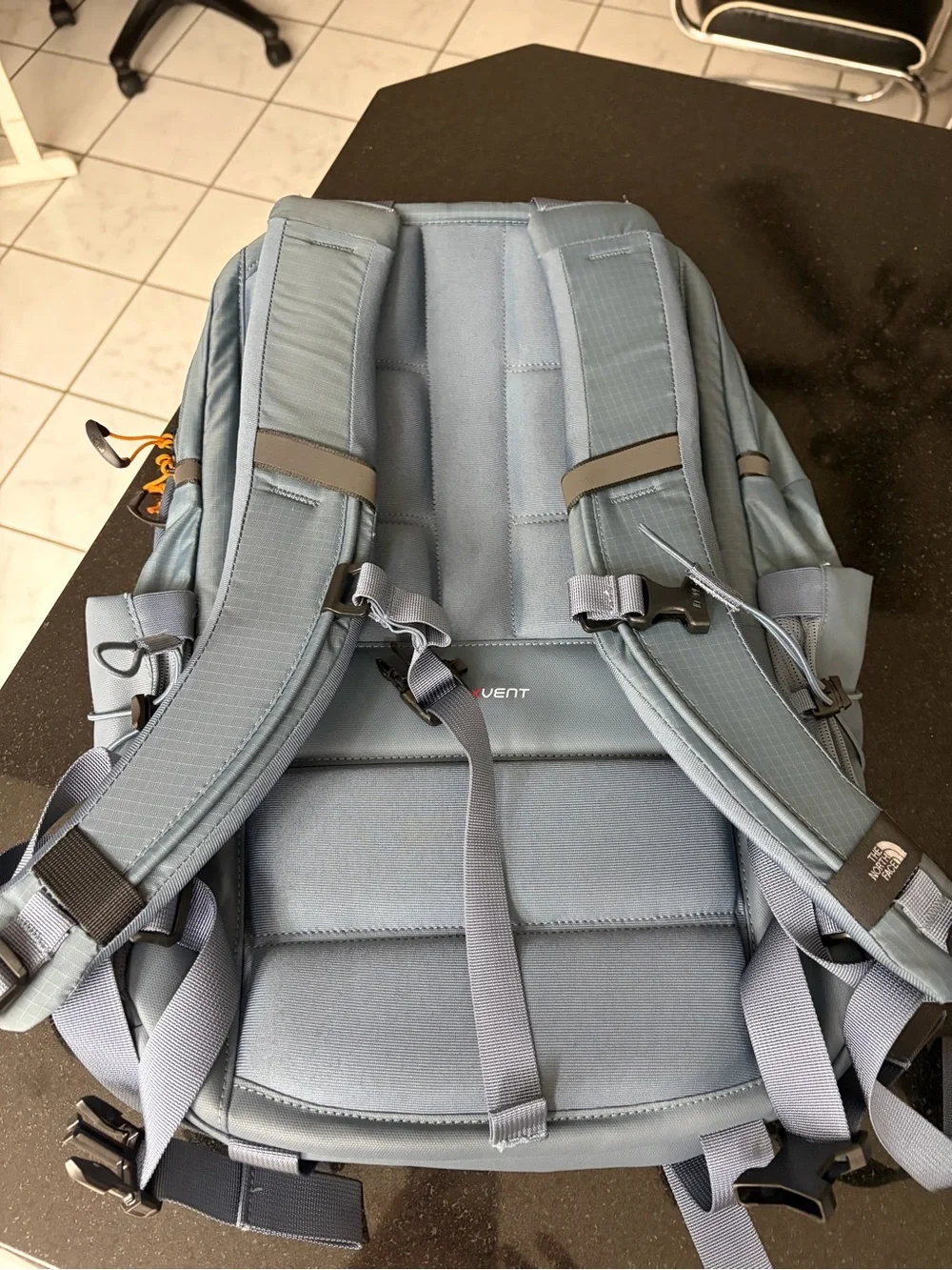 The North Face Borealis Backpack in Granite Grey with Orange Cords